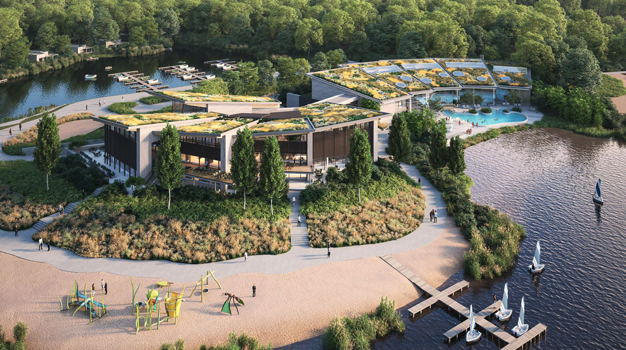 De centrale faciliteiten, met onder meer rechts het binnen- en buitenzwembad Aqua Garden. Door de groene daken en het groen rondom de gebouwen wordt het opgenomen in het groene landschap van Terhills.